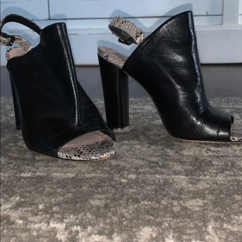 Black leather sling back heels